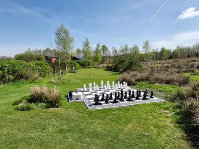a chess set in the middle of a field at Byre 1 InThePark in Stirling