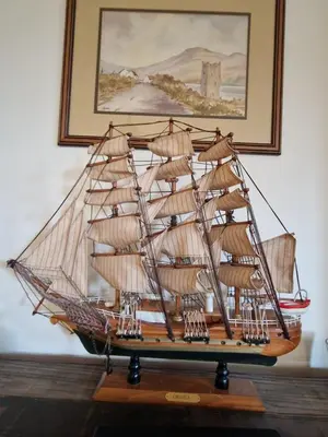 a wooden model of a sailing ship on a table at Byre 1 InThePark in Stirling