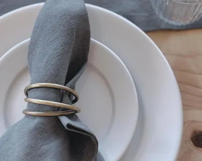 a napkin wrapped around a plate with a napkin at Honeysuckle Cottage in Killean