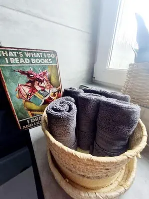 a basket filled with yarn sitting next to a window at Spacious 5bed house, FREE parking, NO PARTY ! in Glasgow