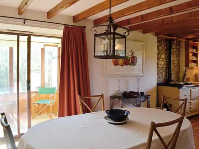 a kitchen with a table with a bowl on it at Arkland Mill in Corsock