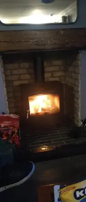 a brick oven with a fire in it at Southend, Mull of Kintyre, Campbeltown in Campbeltown