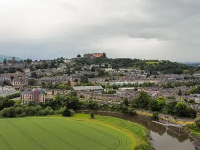an aerial view of a city with a river at The Riverside Rest 1 in Stirling