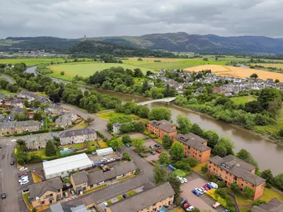 an aerial view of a town next to a river at The Riverside Rest 1 in Stirling