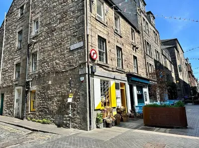 an old brick building on the side of a street at City Centre Hidden Hideout for 2 in Edinburgh