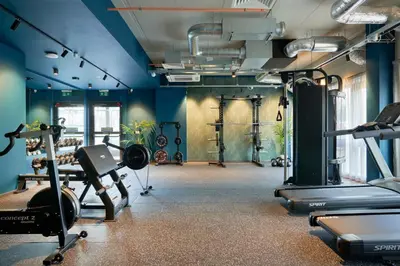a gym with treadmills and elliptical machines at Argyl - Westfield Summer Budget Accommodation, Adults Only in Edinburgh