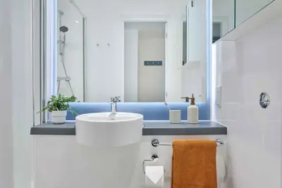 a bathroom with a sink and a mirror at Argyl - Westfield Summer Budget Accommodation, Adults Only in Edinburgh