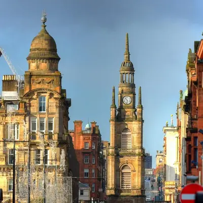 an old building with a clock tower in a city at 1 Bedroom Apartment in Very Central Location in Glasgow