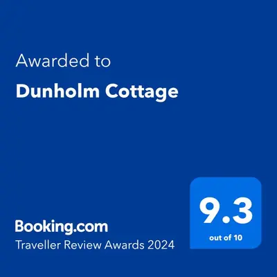 a blue screen with the text awarded to dunlinton coffee at Dunholm Cottage in Skelmorlie