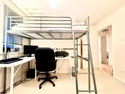 an office with a desk and a bunk bed at Spekman's 3 Bedroom Ap - 20min Glasgow & Edinburgh in Falkirk
