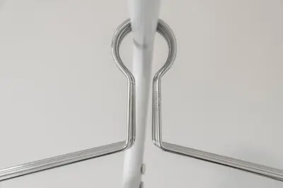 a pair of metal tongs against a white background at Modern 5 Bedroom Townhouse with Free Parking in Glasgow