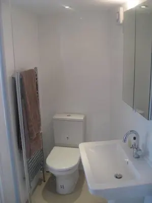 a bathroom with a white toilet and a sink at The Nook, Studio Apartment, South Queensferry in Queensferry