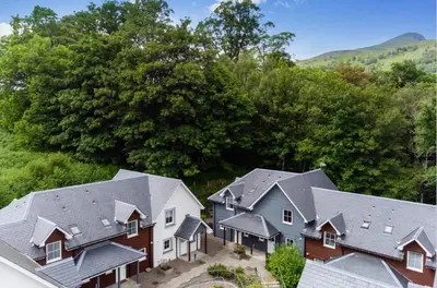 an aerial view of roofs of houses at The Heathers in Killin