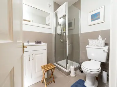a bathroom with a toilet and a shower at Holiday Home Lorn Mill-2 by Interhome in Balloch