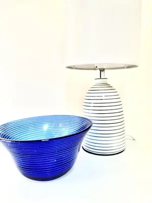 a blue bowl sitting next to a white plate at Luxury Smugglers Cottage in the Heart of Inveraray Sleeps 4 in 2 Bedrooms in Inveraray
