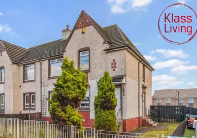 a house with a sign that reads kiss living at Uddingston Apartment by Klass Living in Uddingston