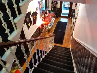 an overhead view of a staircase in a house at Cadillac Kustomz Guest House in Rothesay