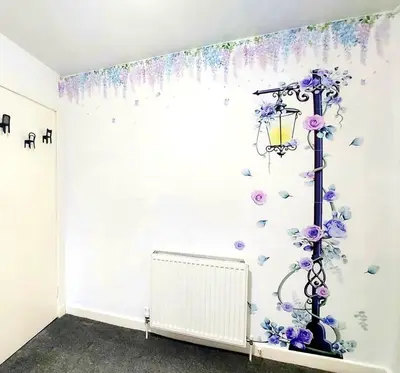 a room with a wall mural of a lantern and flowers at The Blossom - Largs in Largs