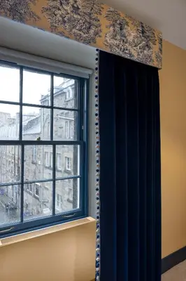 a window with a black curtain and a window sill at Eleven Stafford Street Townhouse in Edinburgh
