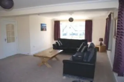 a living room with a couch and a coffee table at Glenview Salen in Salen