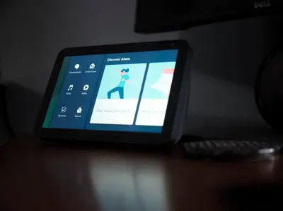 a tablet computer sitting on a table with a remote control at Glasgow, Finnieston Luxury 2 Bed with parking, e-check in, hi-fi in Glasgow