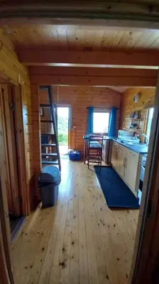 a view of a room in a log house at Ardchiavaig Cabin in Uisken