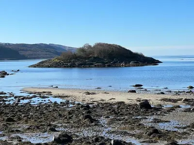 an island in the middle of a body of water at The Lodge in Lochgilphead
