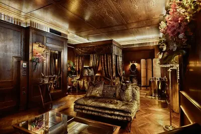 a living room with a couch and a table at House of Gods Glasgow in Glasgow