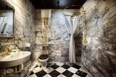 a bathroom with a sink and a toilet at House of Gods Glasgow in Glasgow