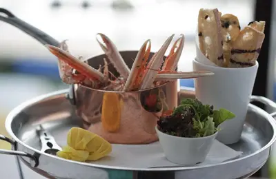 a tray with several different foods on a plate at The Penthouse- The Kingsley Collection in Troon