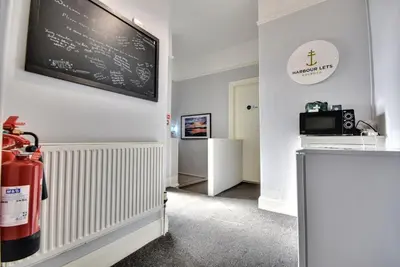 a room with a chalkboard on the wall at The Cove in Gourock