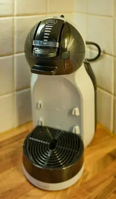 a toaster is sitting on top of a kitchen appliance at Charming 2BD House - Parking & Garden in Oban in Oban