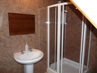 a bathroom with a sink and a shower at Glengorm Guest House in Oban