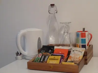 a wooden box with a blender and other items on a counter at Failte Bed & Breakfast in Oban