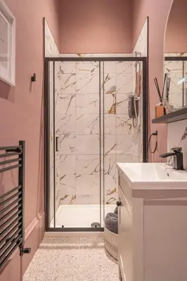 a bathroom with a shower and a sink at Boutique Home Stay Blossom in Paisley