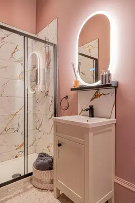a bathroom with a sink and a shower at Boutique Home Stay Blossom in Paisley