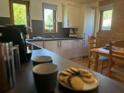 a kitchen with a plate of food on a table at The New Farmhouse in Biggar