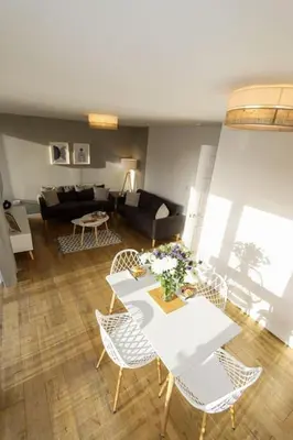 a living room with a white table and chairs at City Views by the Castle, Free Designated Parking. in Stirling