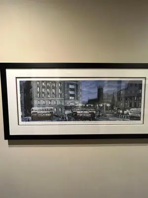 a picture of a city in a frame on a wall at Large Modern Family Home in Murrayfield - Very close to City Centre - 10 mins by Direct Bus - Private Driveway & Garden in Edinburgh