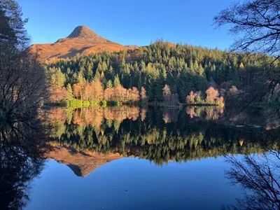 a view of a lake with a mountain in the background at Fuaim Na Mara, The Sound Of The Sea. in Fort William