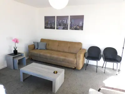 a living room with a couch and two chairs at No 54 - New & delightful 3 bed house in East Kilbride in Glasgow
