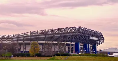 a large metal structure in front of a building at Spacious Murrayfield Flat - Pass the Keys in Edinburgh