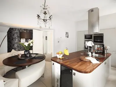 a kitchen with a wooden counter top in a room at Island Seaview Villa in Rothesay