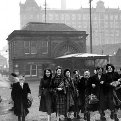 a group of women standing in front of a building at Paisley Pattern Flat West End UWS UNI GLA Glasgow Airport in Elderslie