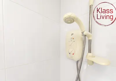 a bathroom with a blow dryer in a shower at Aitkenhead house by Klass Living in Coatbridge