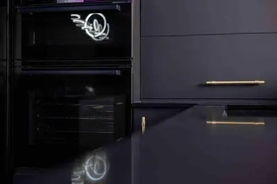 a black oven with a cigarette on top of it at Luxury Couples Get-Away Glasgow in Knightswood