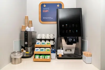 a coffee machine sitting on top of a counter at Holiday Inn Express Stirling by IHG in Stirling