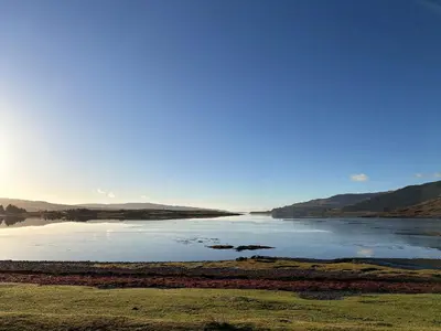 a large body of water with mountains in the background at Argyll House The Byre in Salen