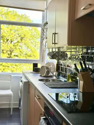 a kitchen with a sink and a window at Dumbarton cosy home, Loch Lomond in Dumbarton