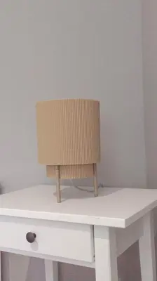 a chair sitting on top of a white desk at Castlemilk Apartment in Glasgow